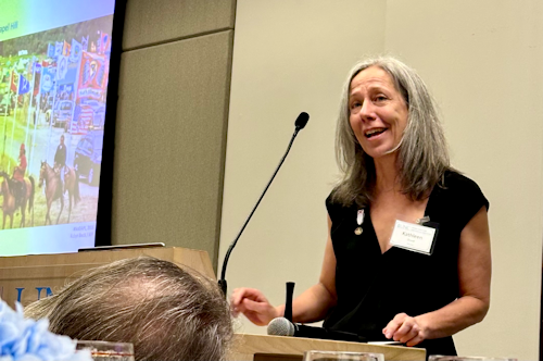 Kathleen Duvall wearing her SAR Galvez medal after presentation at the retired faculty association luncheon March 11, 2026.