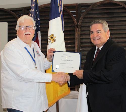 Chapter President Gervais Compton presented Hon. Kerry Spruill with a Certificate of Appreciation and an LASSAR mug for Spruill's presentation on the history of the Sixth and the Seventh Amendments of the U.S. Constitution that guarantees the right to a jury trial in criminal and civil cases.