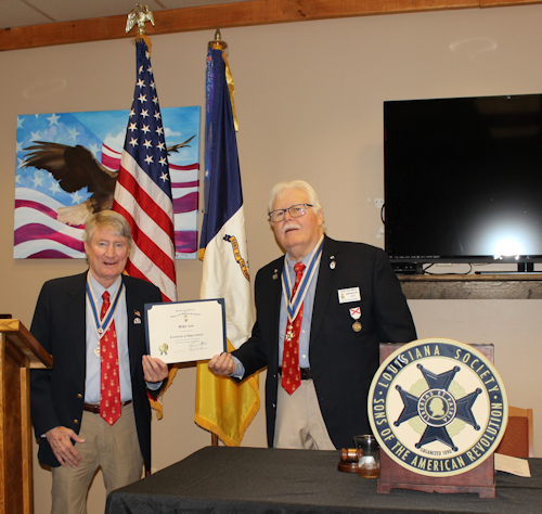 Mike Lee was presented a Certificate of Appreciation for his talk about WWII battles in the Pacific Theater.